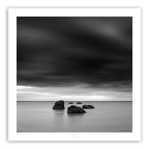 5 Stones surrounded by water